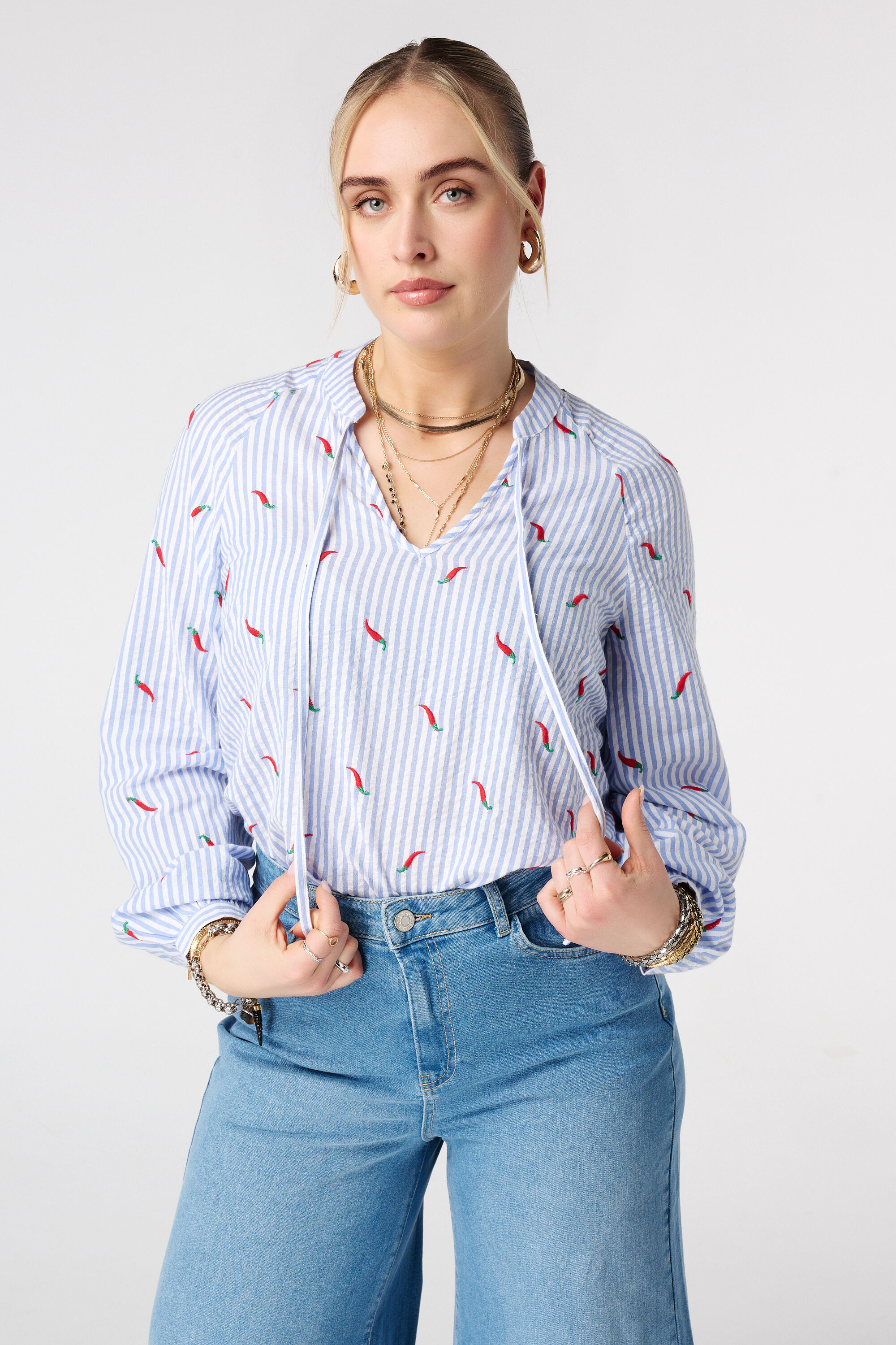 Blouse ray&eacute;e avec imprim&eacute;