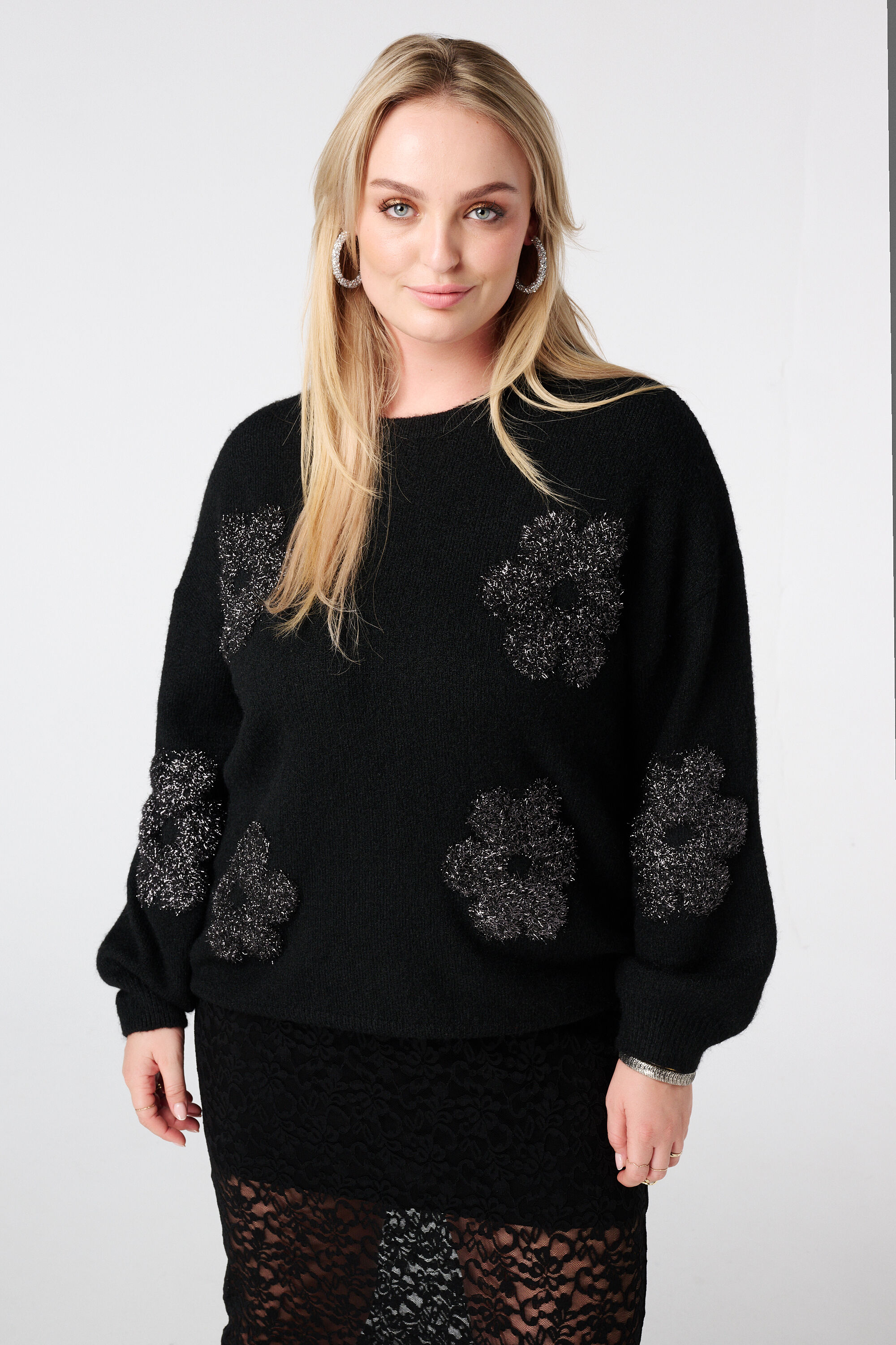 Pull avec fleurs douces en lurex