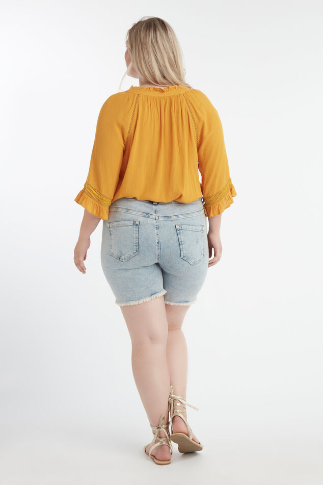 Short à bordure orange scintillante image number 4