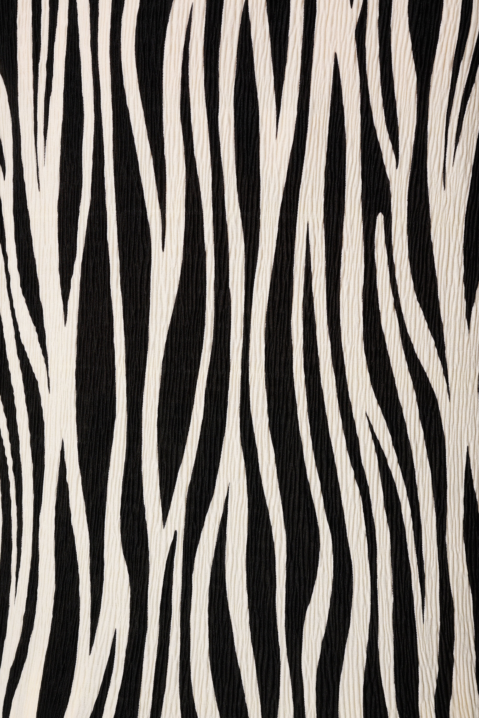 Haut textur&eacute; et mancherons image number 6