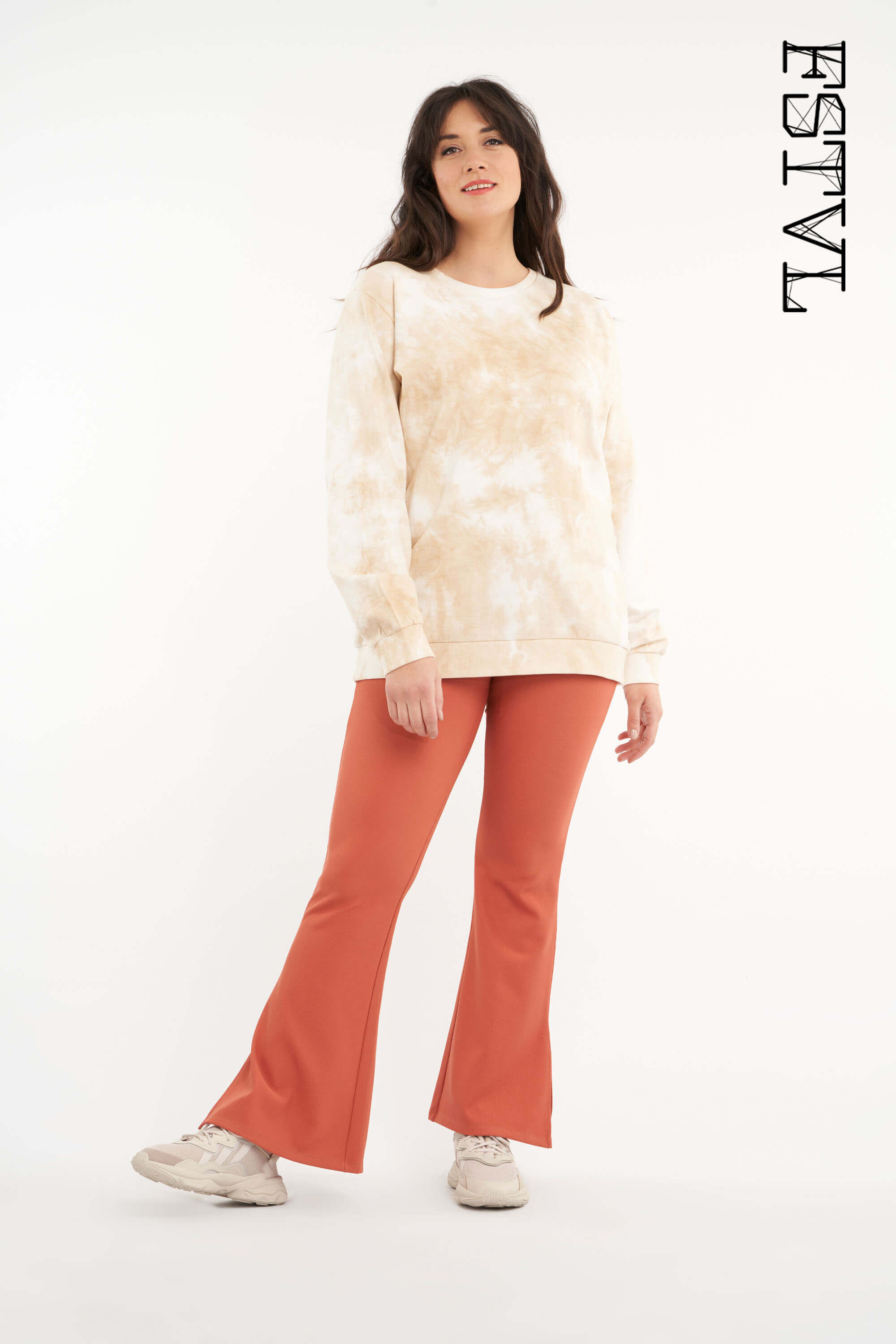 Legging &eacute;vas&eacute; avec fentes