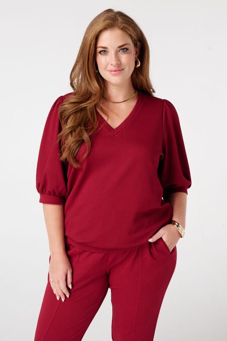 Haut à manches bouffantes  Haut à manches bouffantes