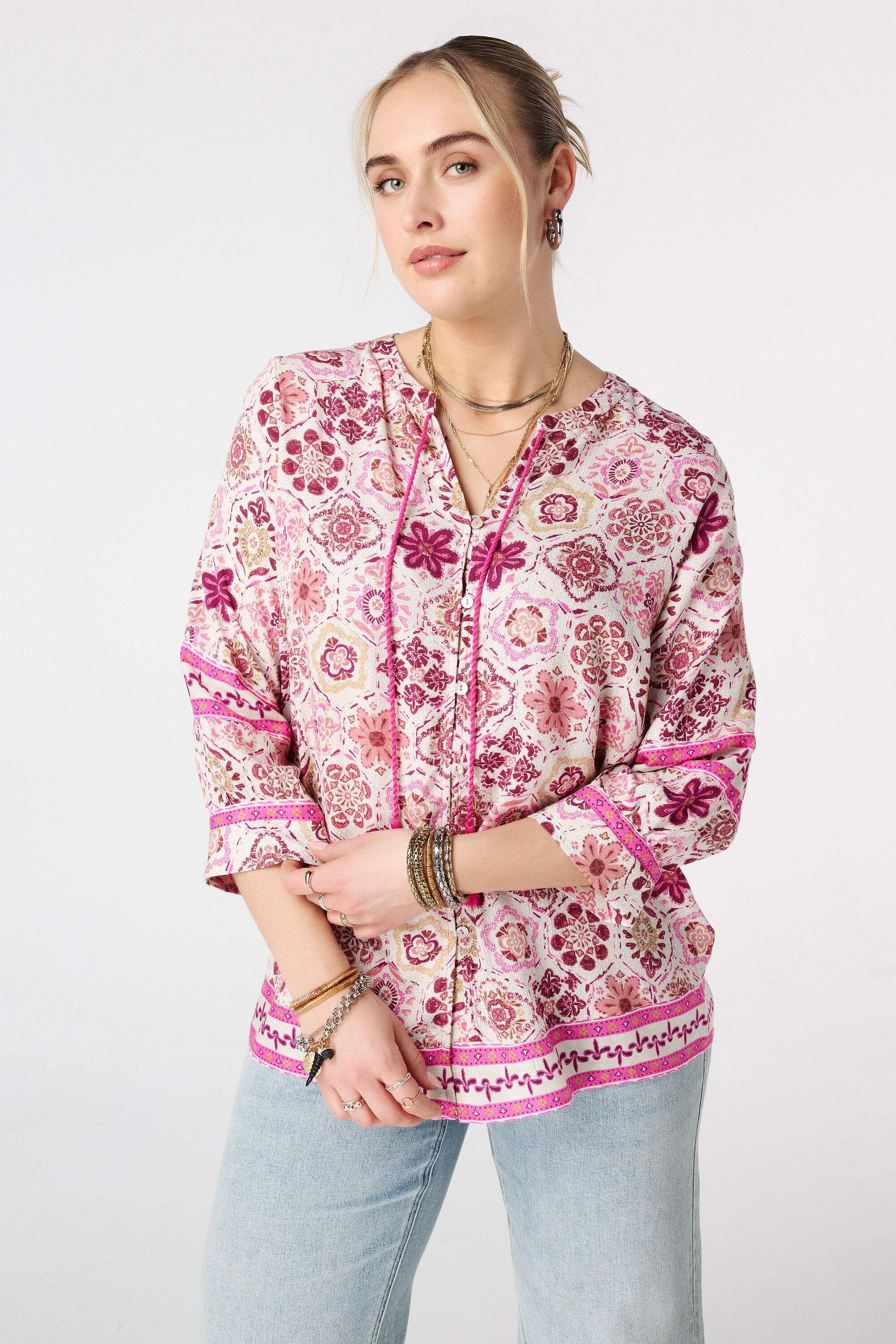 Blouse &agrave; fermeture boutonn&eacute;e
