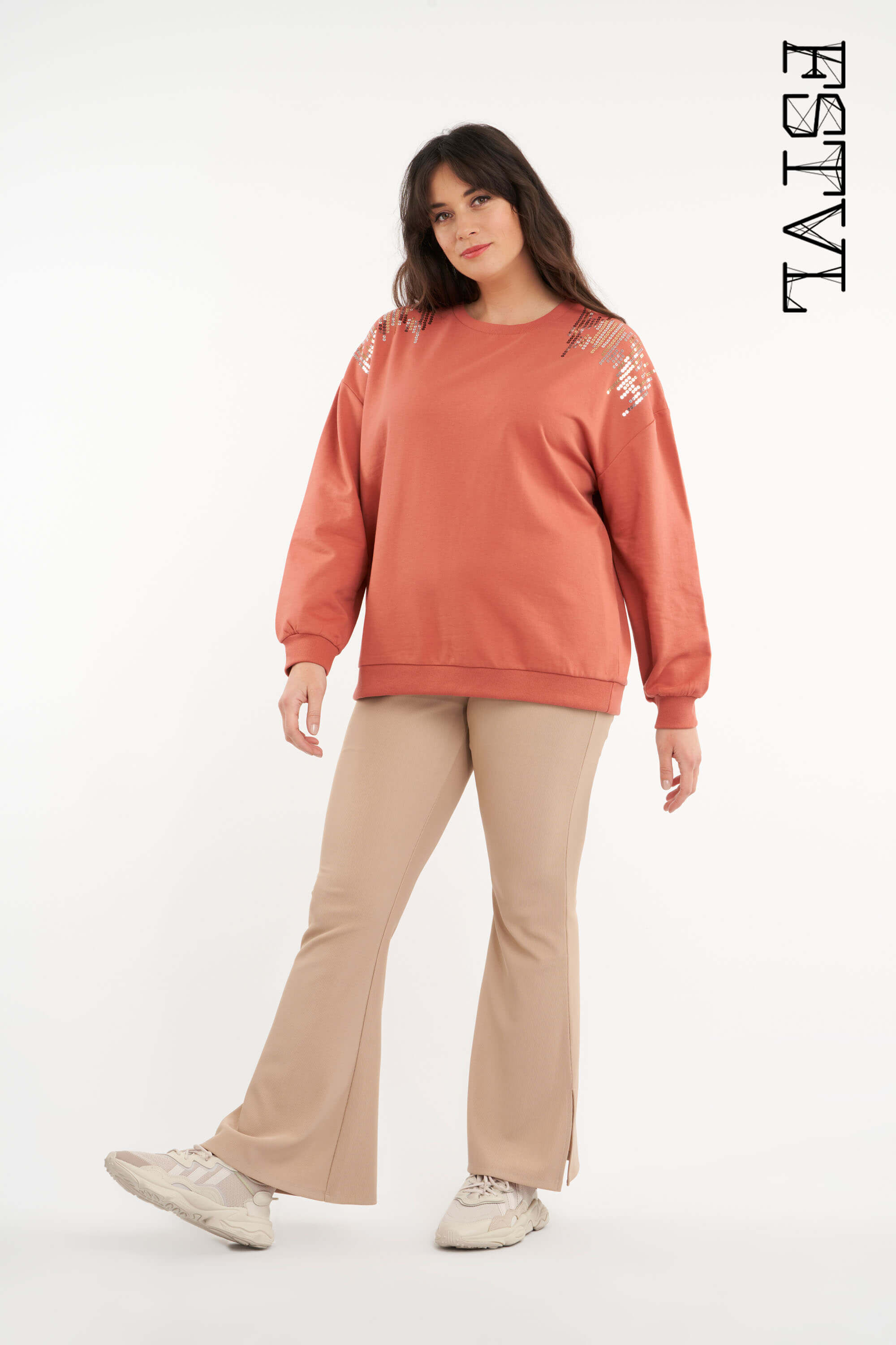 Legging &eacute;vas&eacute; avec fentes