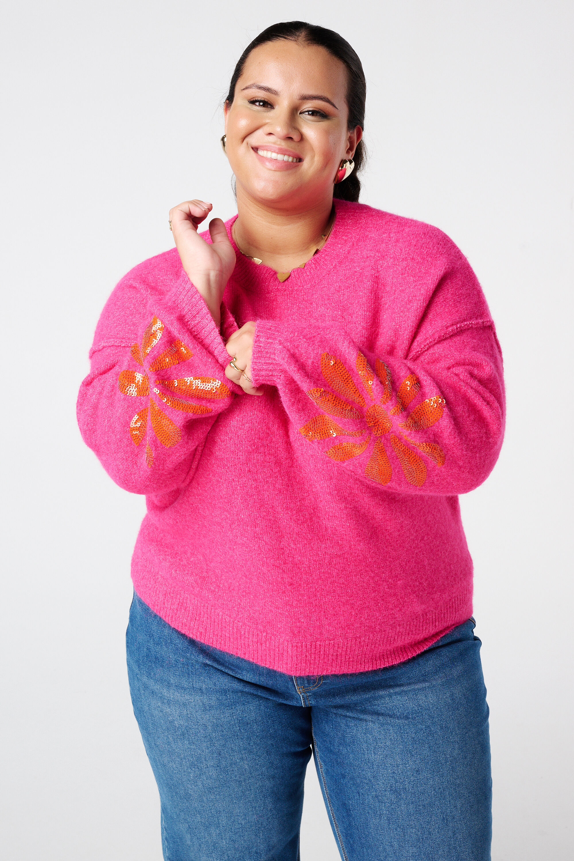 Pull tricot&eacute; avec paillettes sur les manches