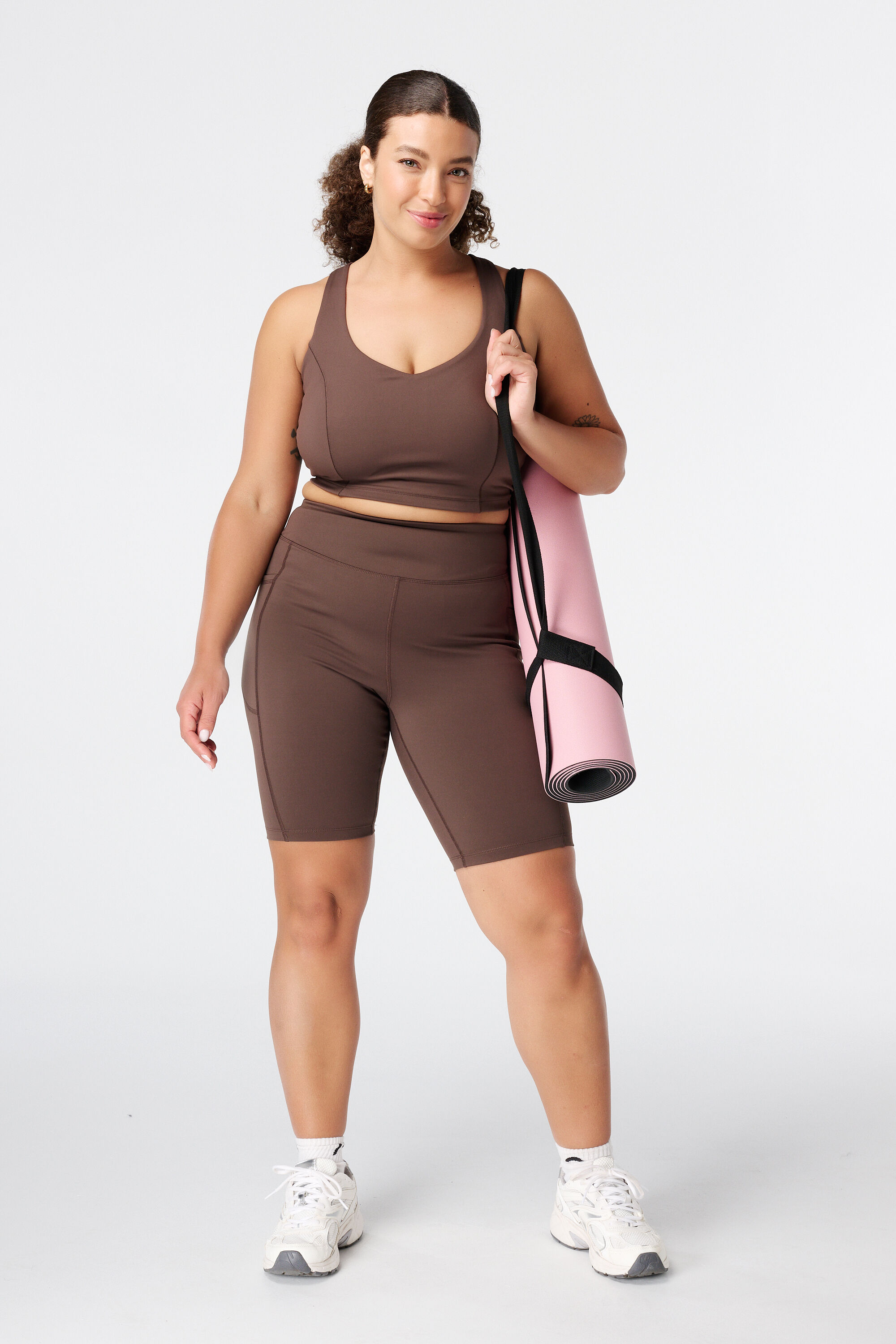 Legging de sport courte avec poches lat&eacute;rales