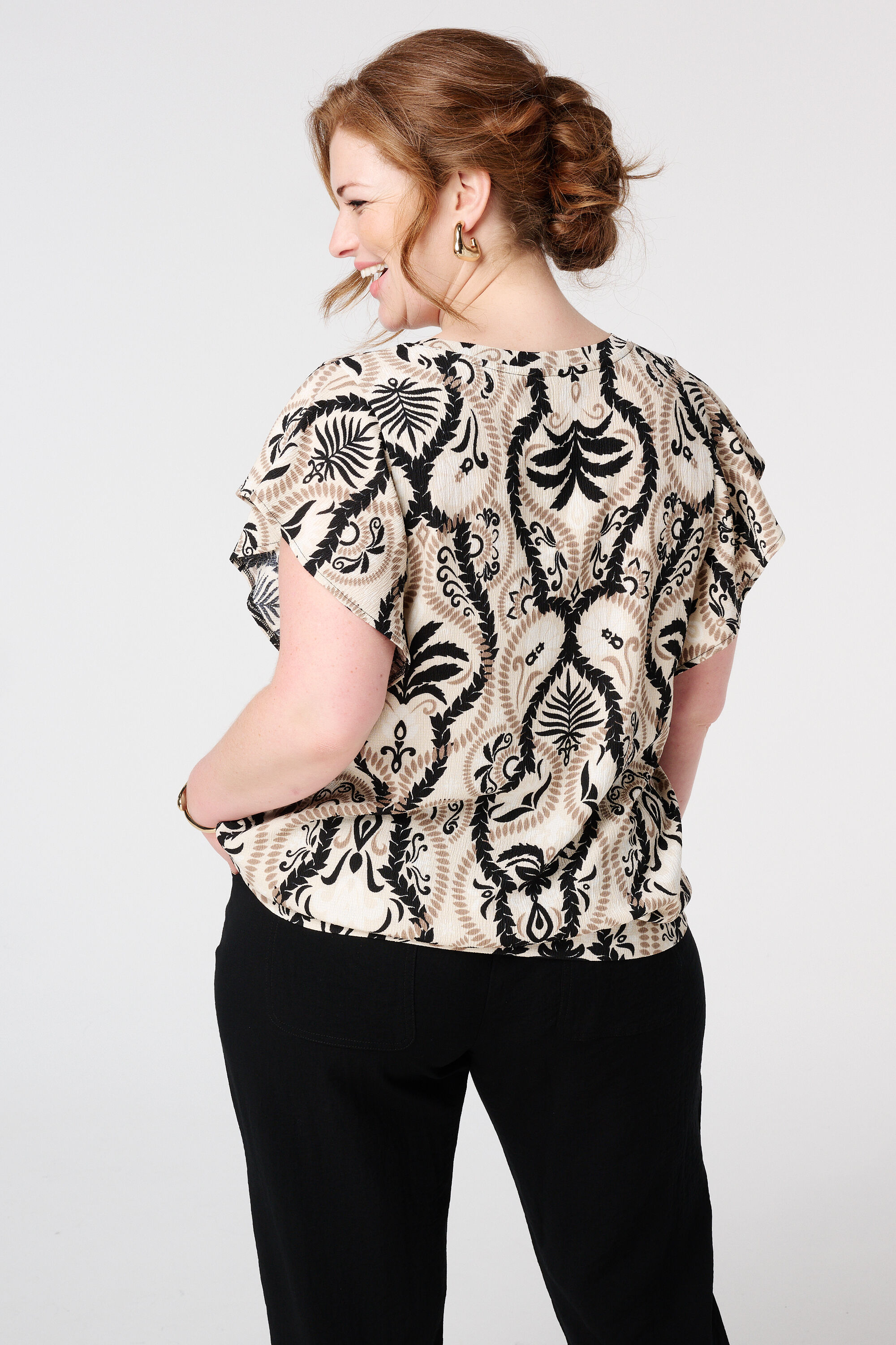 Haut textur&eacute; et mancherons image number 3