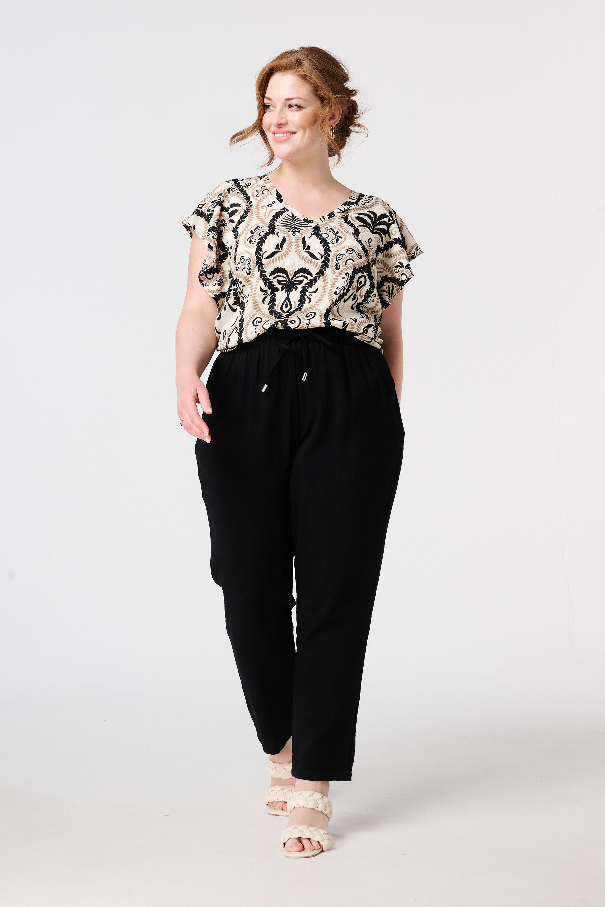 Haut textur&eacute; et mancherons image number 5