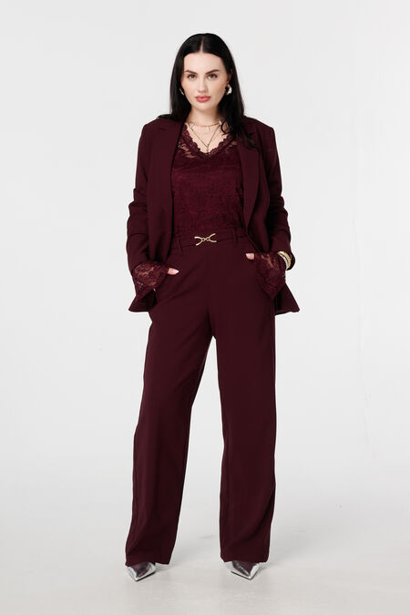 Pantalon avec boucle dorée Pantalon avec boucle dorée