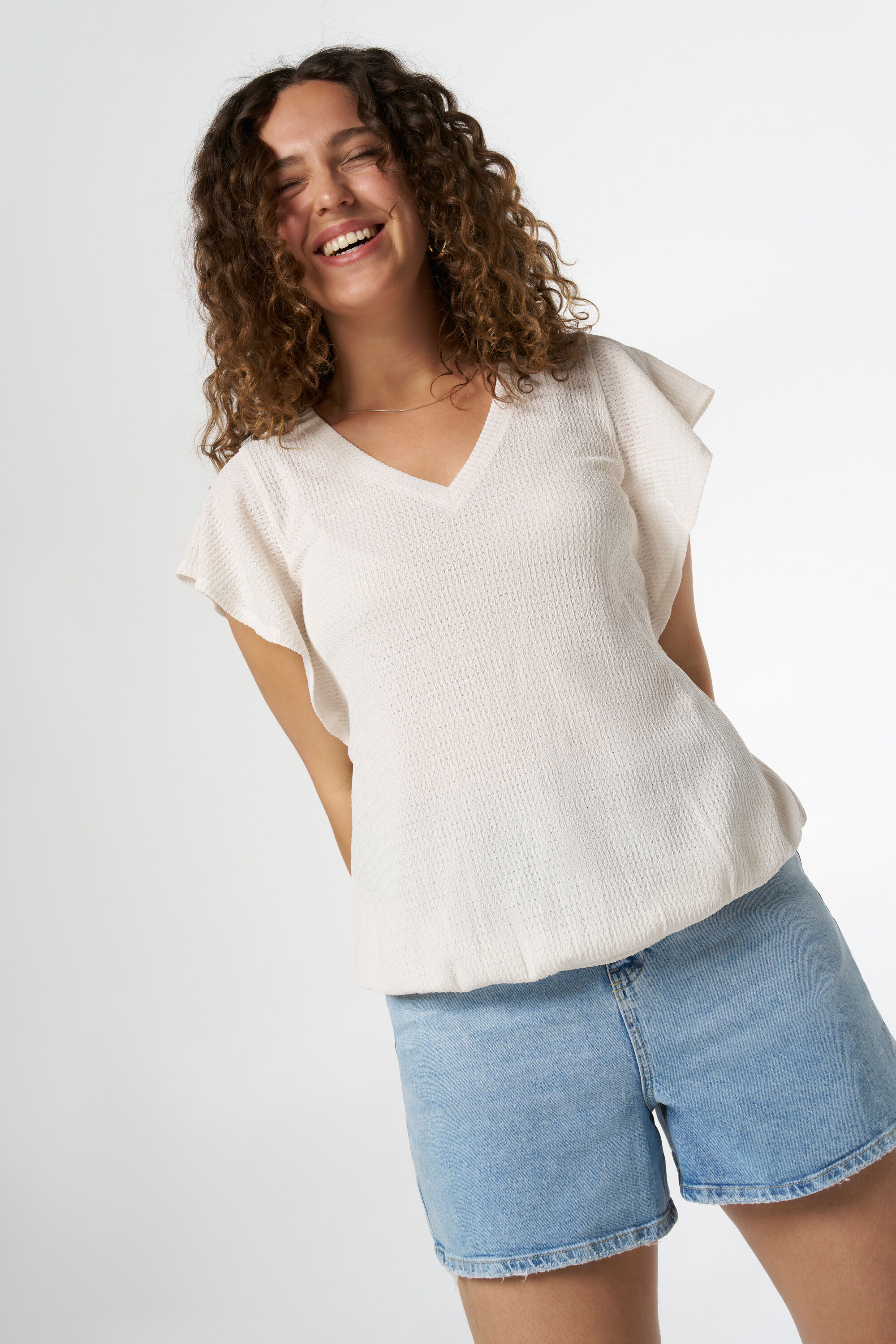 Haut textur&eacute; avec col en V image number 0