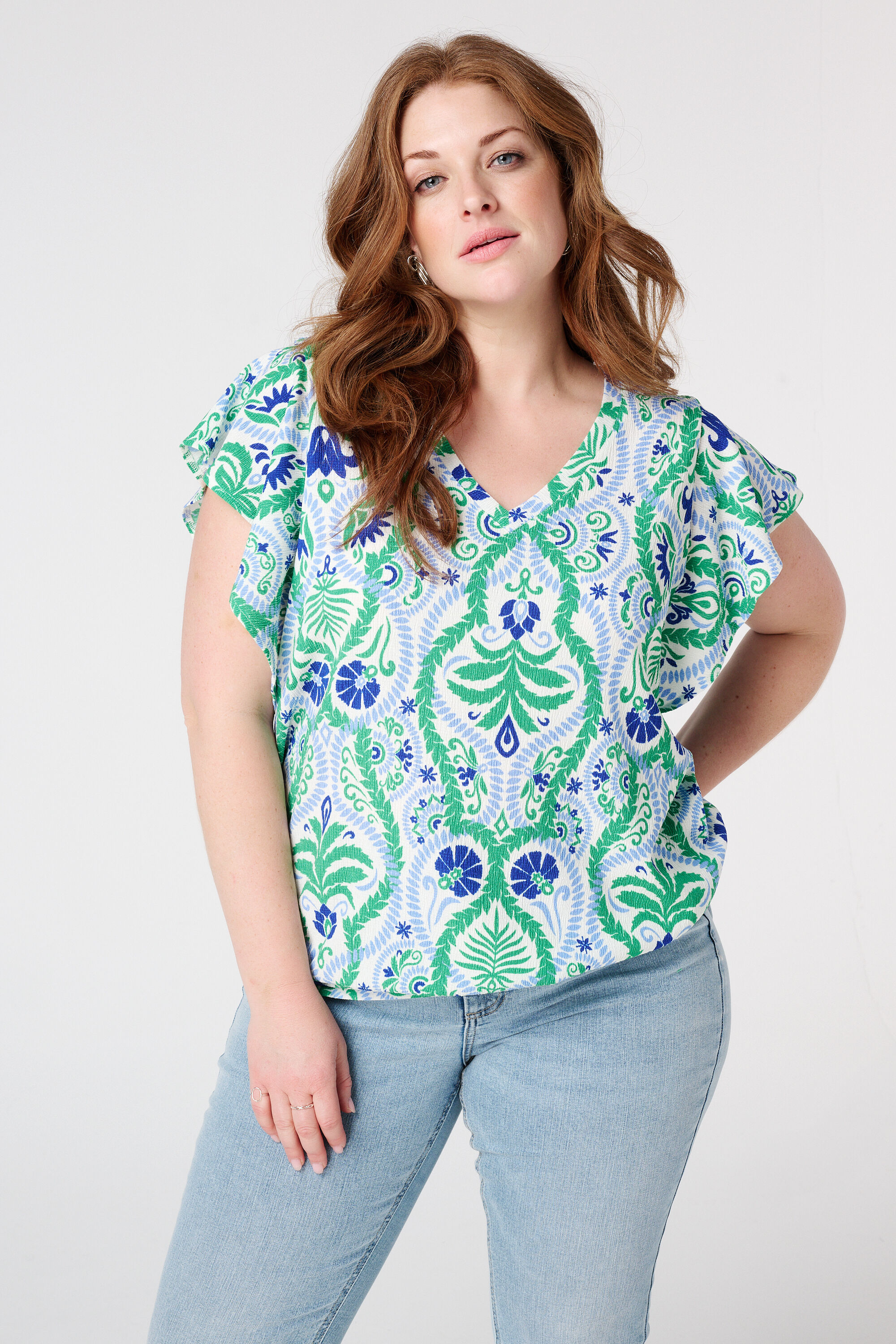 Haut textur&eacute; et mancherons image number 3