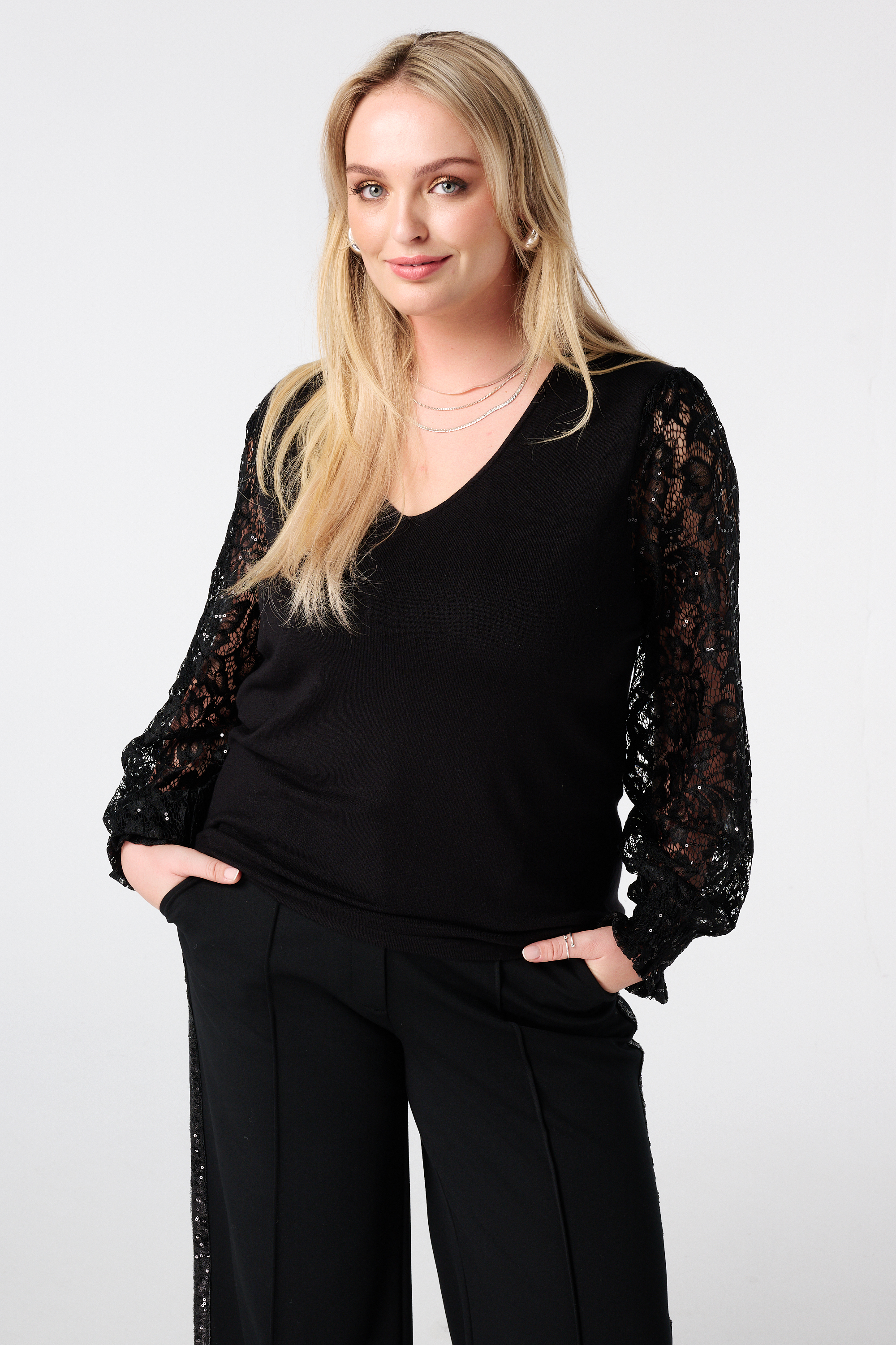 Pull à manches en dentelle et paillettes